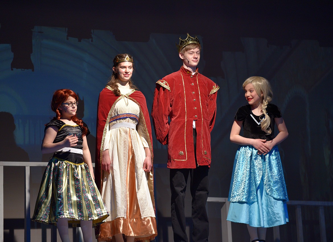 Felicity Royer, as young Anna, Maria Sasse, as Queen Iduna, Josh Degerness, as King Agnarr, and Kiera Reed, as Young Elsa, stand inside the Arendell Castle during the opening scenes of &#147;Elsa and Anna&#148; during a rehearsal Wednesday afternoon at the Whitefish Performing Arts Center. (Heidi Desch/Whitefish Pilot)