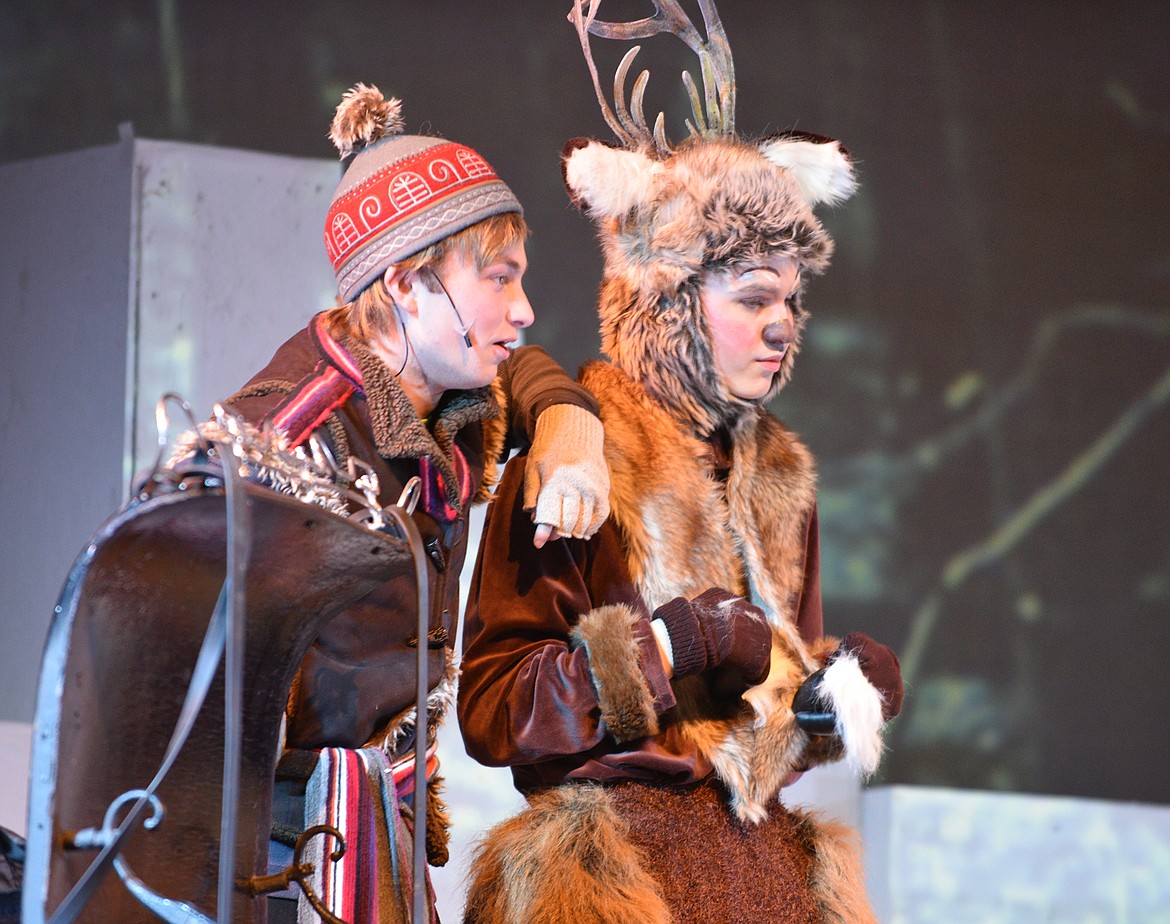 Jonathan Landis as Kristoff talks with Josh Brown as Sven the reindeer while preparing their sleigh during a rehearsal Wednesday afternoon for &#147;Elsa and Anna&#148; at the Whitefish Performing Arts Center. (Heidi Desch/Whitefish Pilot)