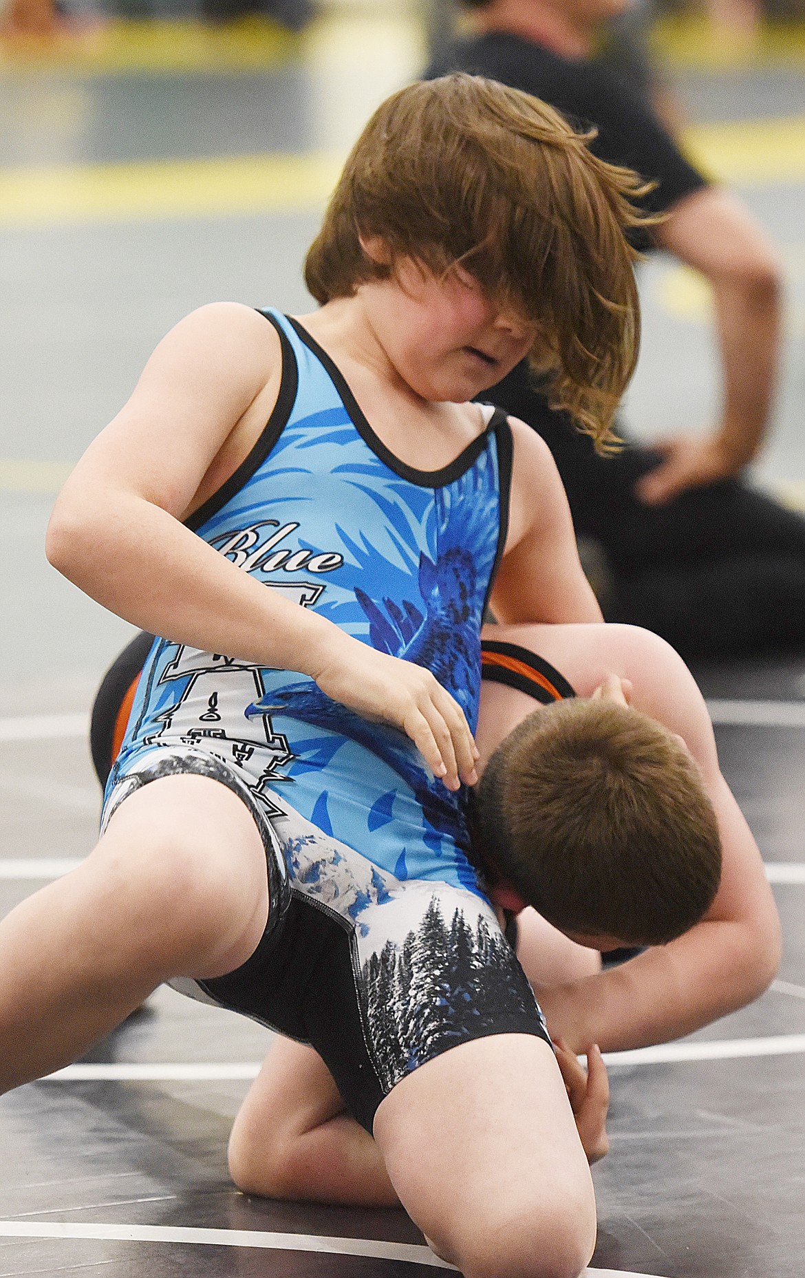 LIAM PALLISTER, in blue singlet, was the lone Thompson Falls wrestler at the WMLG state tourney. Pallister placed second in Novice 90.