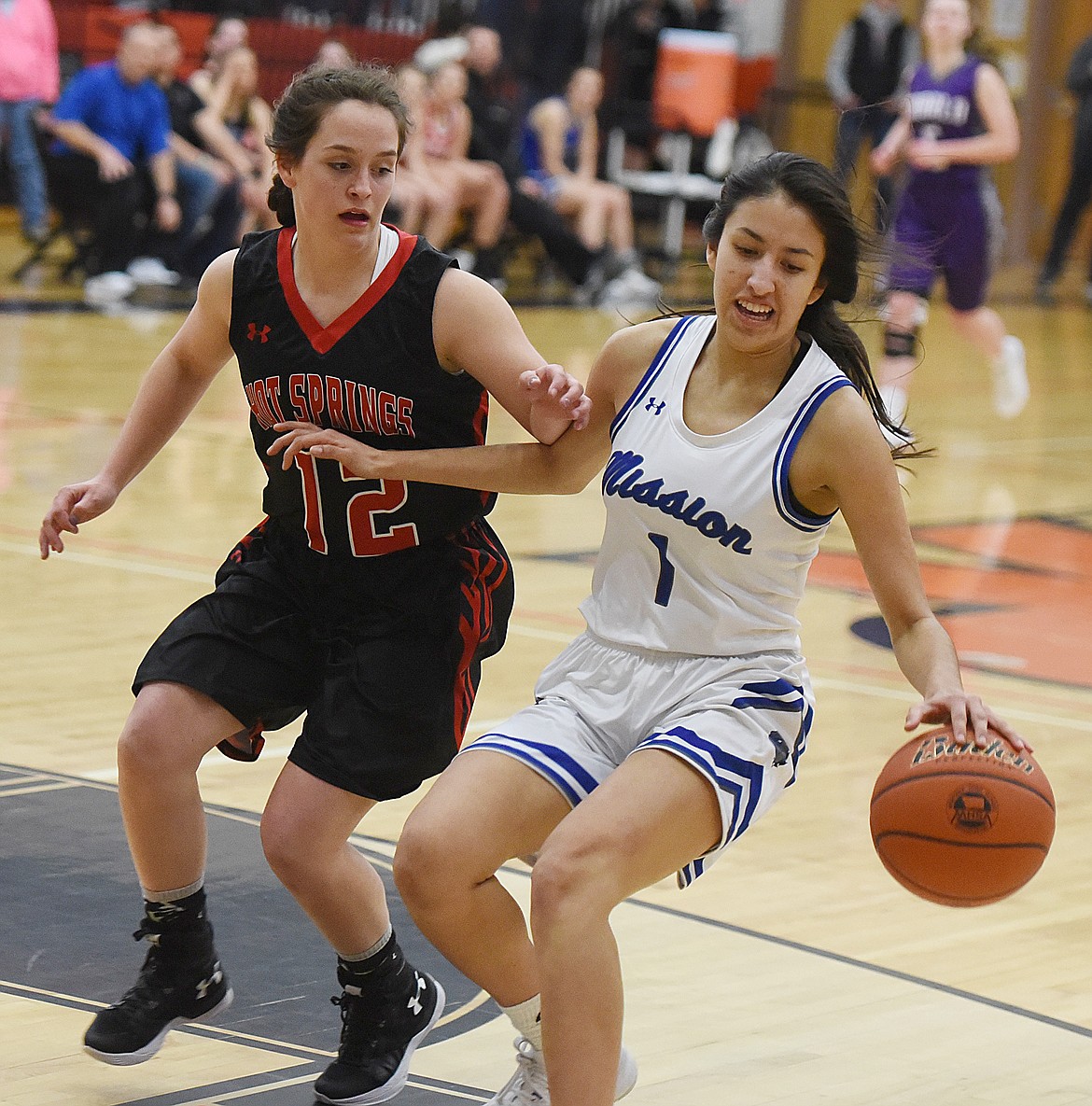 SYDNEY JACKSON of Hot Springs puts pressure on Karolyna Buck of Mission in the Mission Valley All-Star girls&#146; contest.