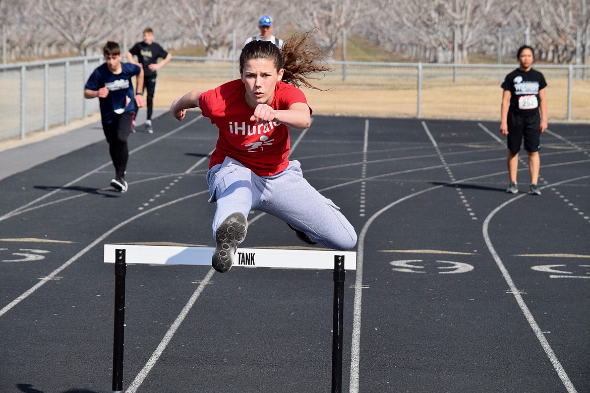 Charles H. Featherstone/courtesy photo
A Wahluke High School student does her best to keep her form perfect while going over a hurdle.