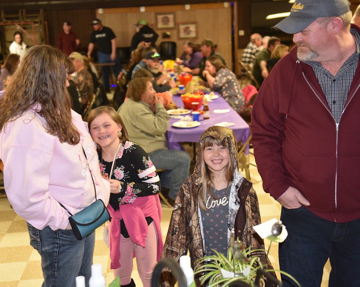 STOPPING BY the Plains VFW Post for the annual Plains/Hot Springs softball fundraiser March 9 were members of the VonHeeder family, from left, Kelly, Jersey, Jenalee and Calvin.