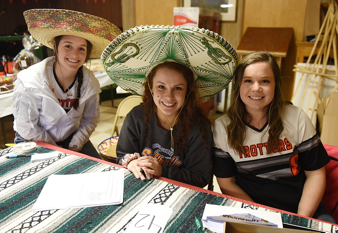 PLAINS/HOT SPRINGS&#146; softball team held its annual fundraiser on March 9 at the Plains VFW Post, serving a delicious spaghetti dinner. Pictured, from left, are Three Amigos Sydney Jackson, Kassidy Kinzie and Natalee Deschamps. Due to the presence of snow, Plains/Hot Springs&#146; season opener Tuesday, March 19 was postponed. The season now is set to open Saturday, April 6 at home. (Joe Sova photos/Clark Fork Valley Press)