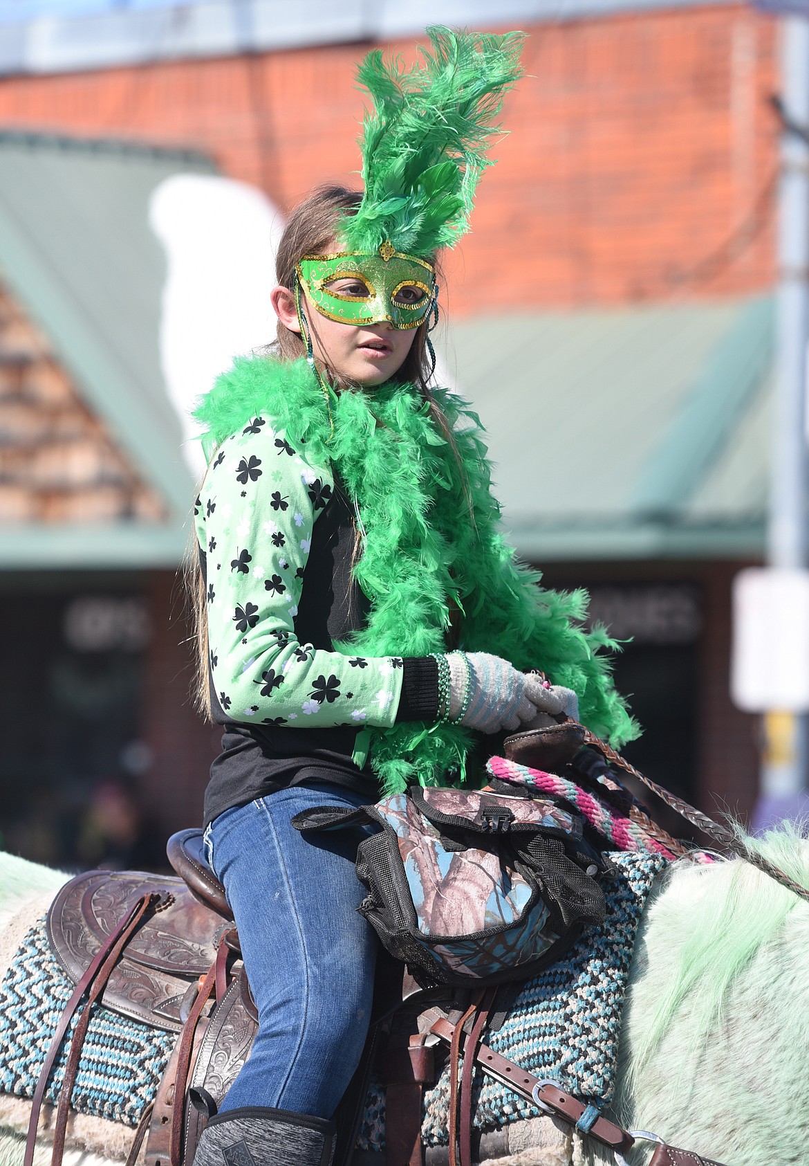 SARAH TEMPLER went all out to make her TRIC St. Patrick&#146;s Day Parade entry colorful. She even painted her horse green to coincide with the Irish holiday. The Templer Family won awards in the Greenest and Family Wars categories.