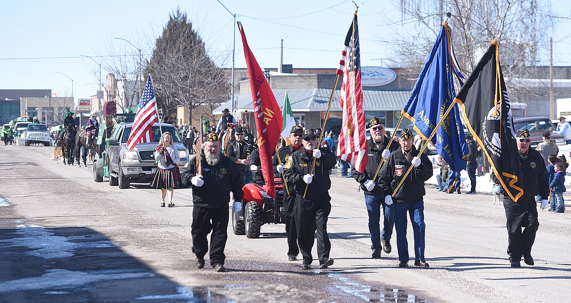 A COLOR GUARD leads the procession during the TRIC St. Patrick's Day Parade on Sunday, March 17 on Main Street in Ronan.