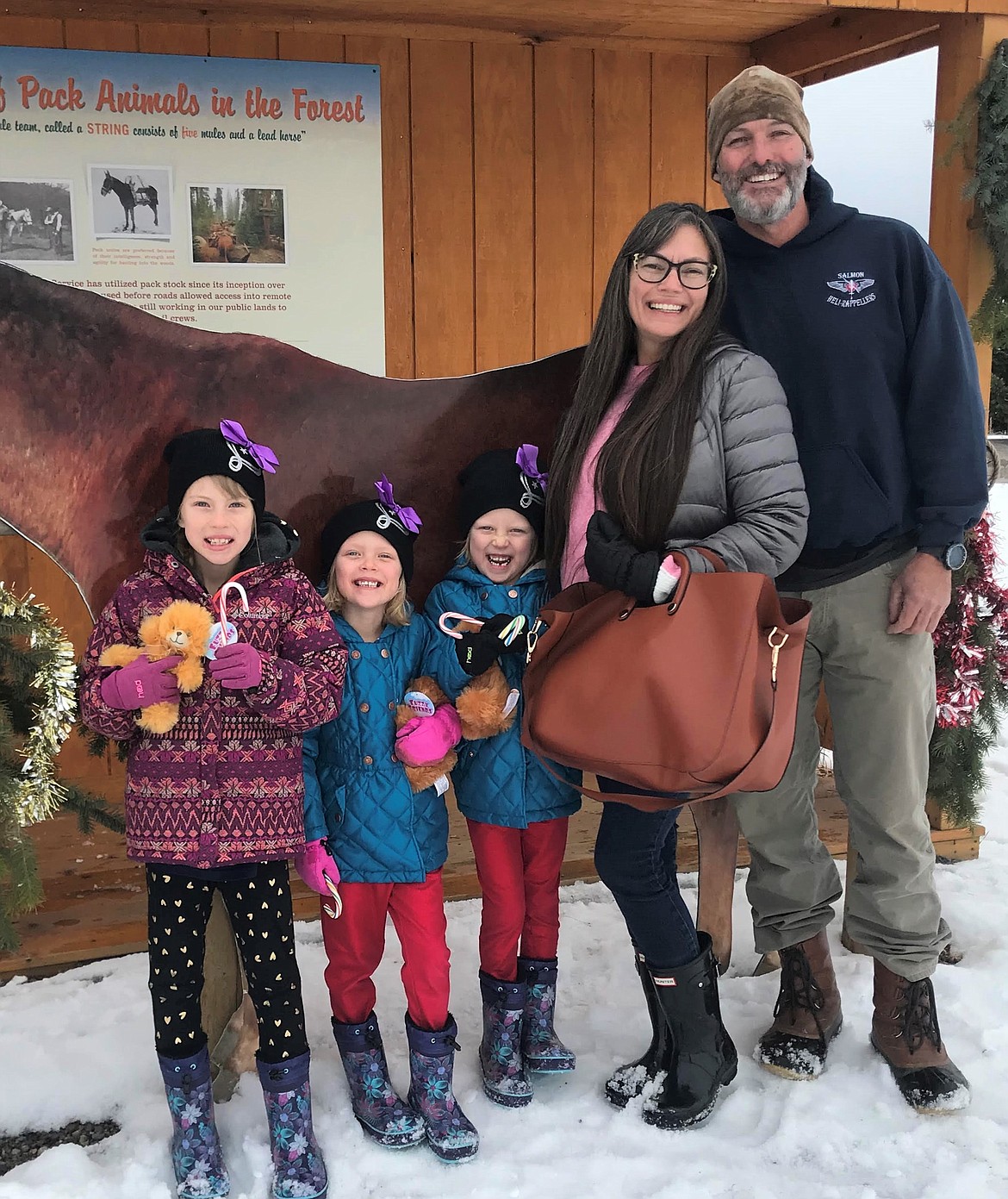 A grandparents caregiver support group has started in Mineral County. The group, called Montana Kinship Navigator Program, will hold meetings on Mondays from 2 to 4 p.m. at Whipped Up Cafe in Alberton. The facilitor is AnnaMarie White (second right) along with husband Ron (right). They care for their three grandchildren Ava, Olivia and Penelope (left to right). (Photo Courtesy AnnMarie White)