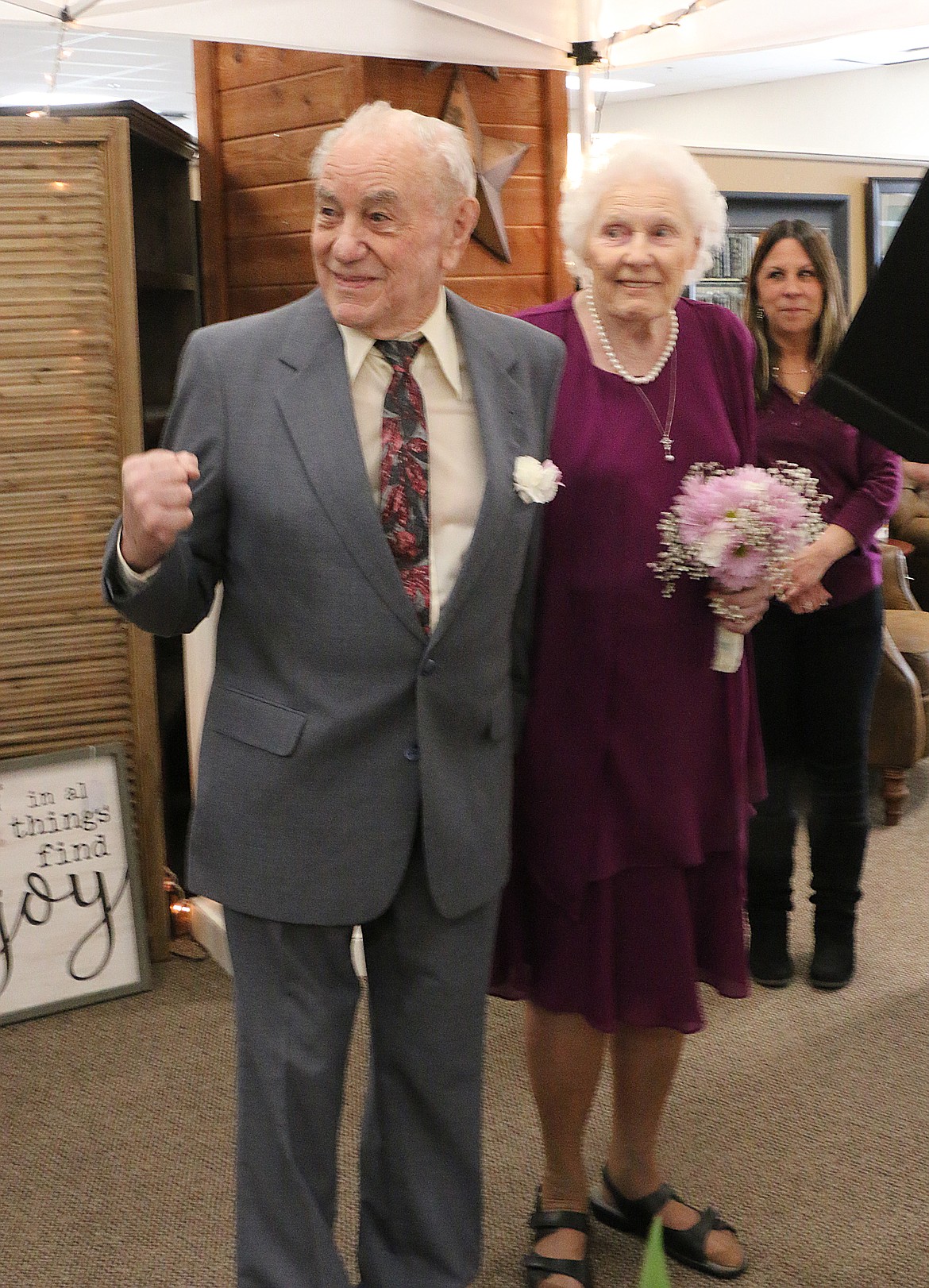 (Photo by CAROLINE LOBSINGER)
Glenn Hescock jokingly threatens those gathered to witness his wedding to Doris Trussell after the minister asked if anyone had any objection to speak now or forever hold their peace.