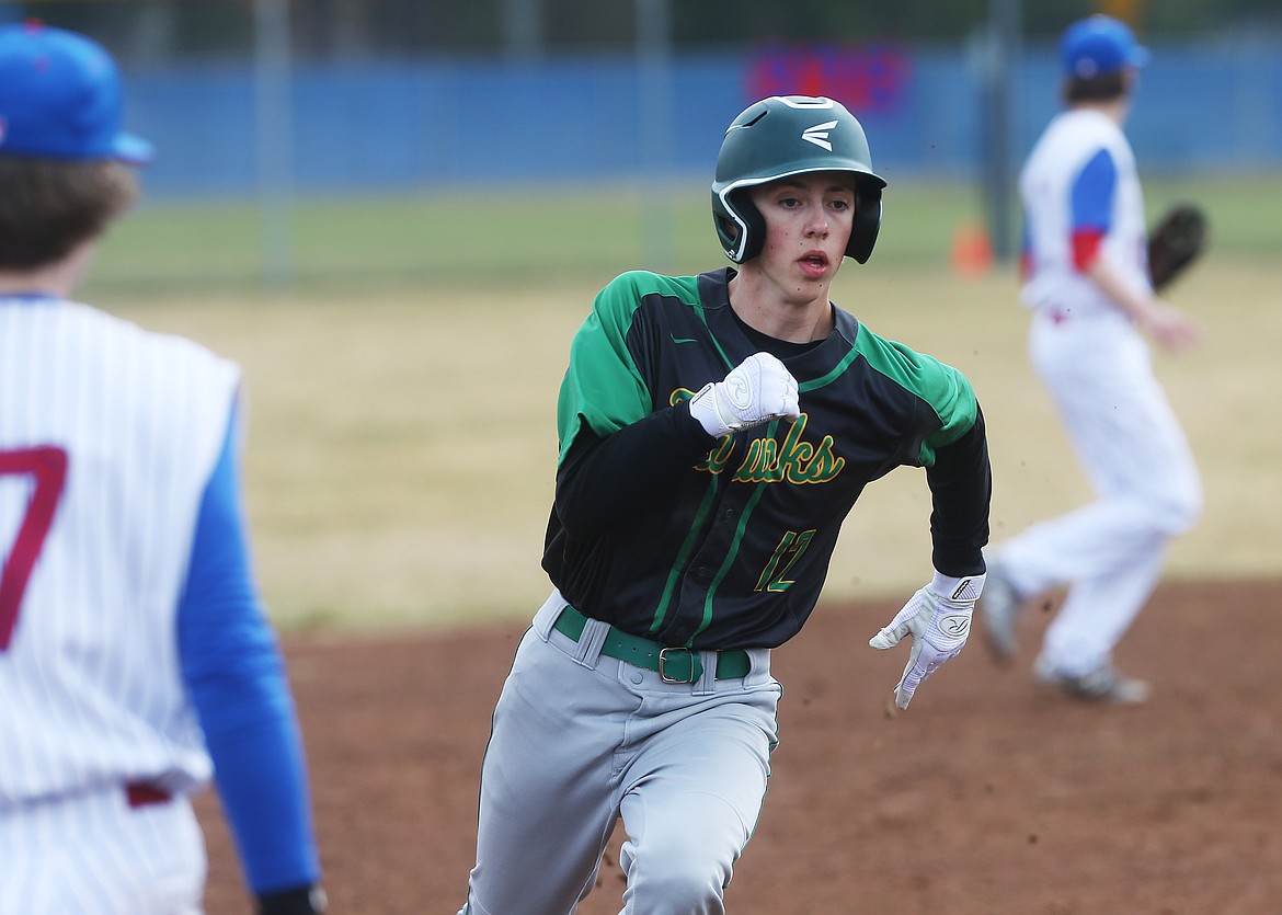Lakeland&#146;s Tristan Clift rounds third base on his way to score a run in Wednesday&#146;s game against Coeur d&#146;Alene.