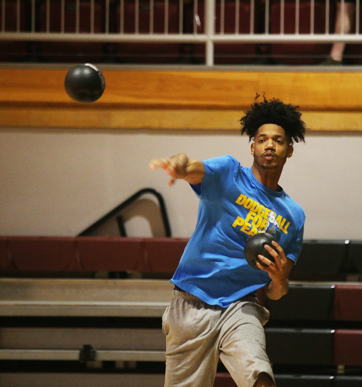 Ismael Valdez hurls a dodgeball during the inaugural community dodgeball tournament held in the Christianson Gym on Friday.