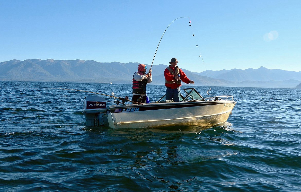 Bill Hawkins of Sandpoint helps his daughter, Caroline, land a kokanee from Lake Pend Oreille.

(File photo/
 courtesy
IDAHO DEPARTMENT 
OF FISH 
AND GAME(