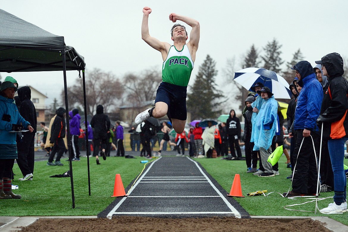 Glacier's Sean Hegstad competes in the long jump at the Flathead Mini Invite at Legends Stadium on Tuesday. (Casey Kreider/Daily Inter Lake)