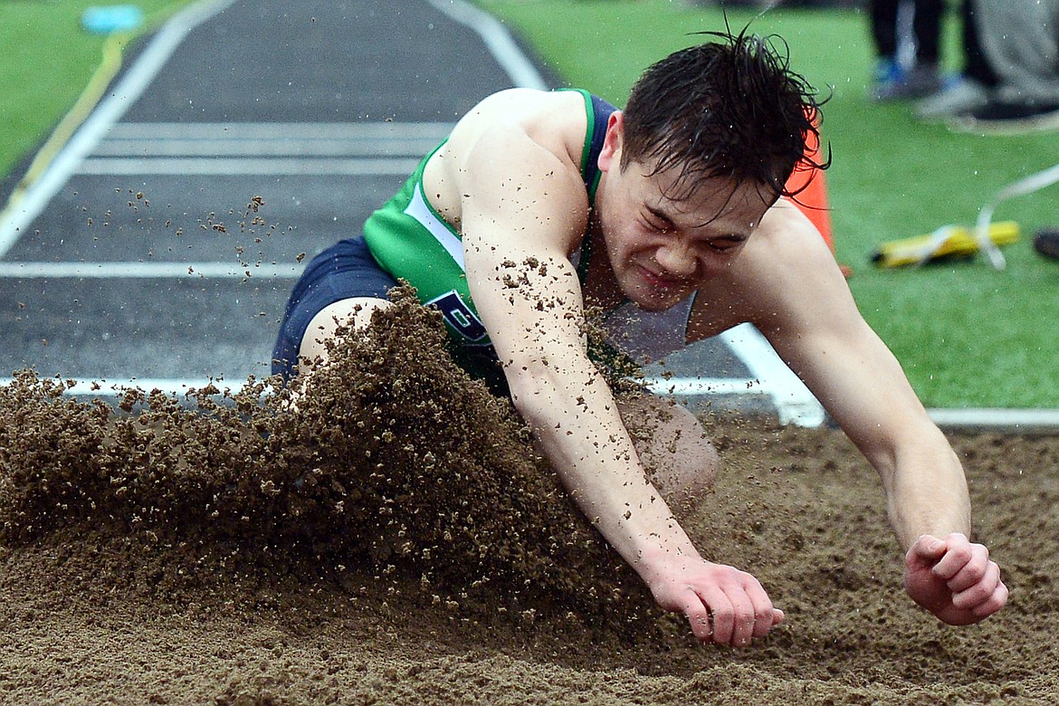 Glacier's Sean Hegstad competes in the long jump at the Flathead Mini Invite at Legends Stadium on Tuesday. (Casey Kreider/Daily Inter Lake)