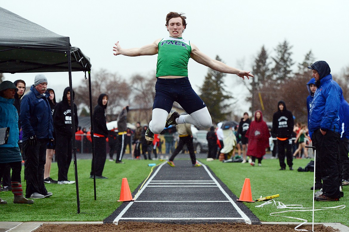 Glacier's Cole Crosby competes in the long jump during the Flathead Mini Invite at Legends Stadium on Tuesday. (Casey Kreider/Daily Inter Lake)