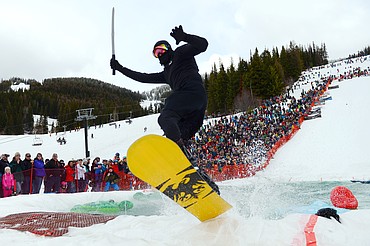 Hugh Black flies out of the pond during the 2019 Whitefish Pond Skim at Whitefish Mountain Resort on Saturday. (Casey Kreider/Daily Inter Lake)