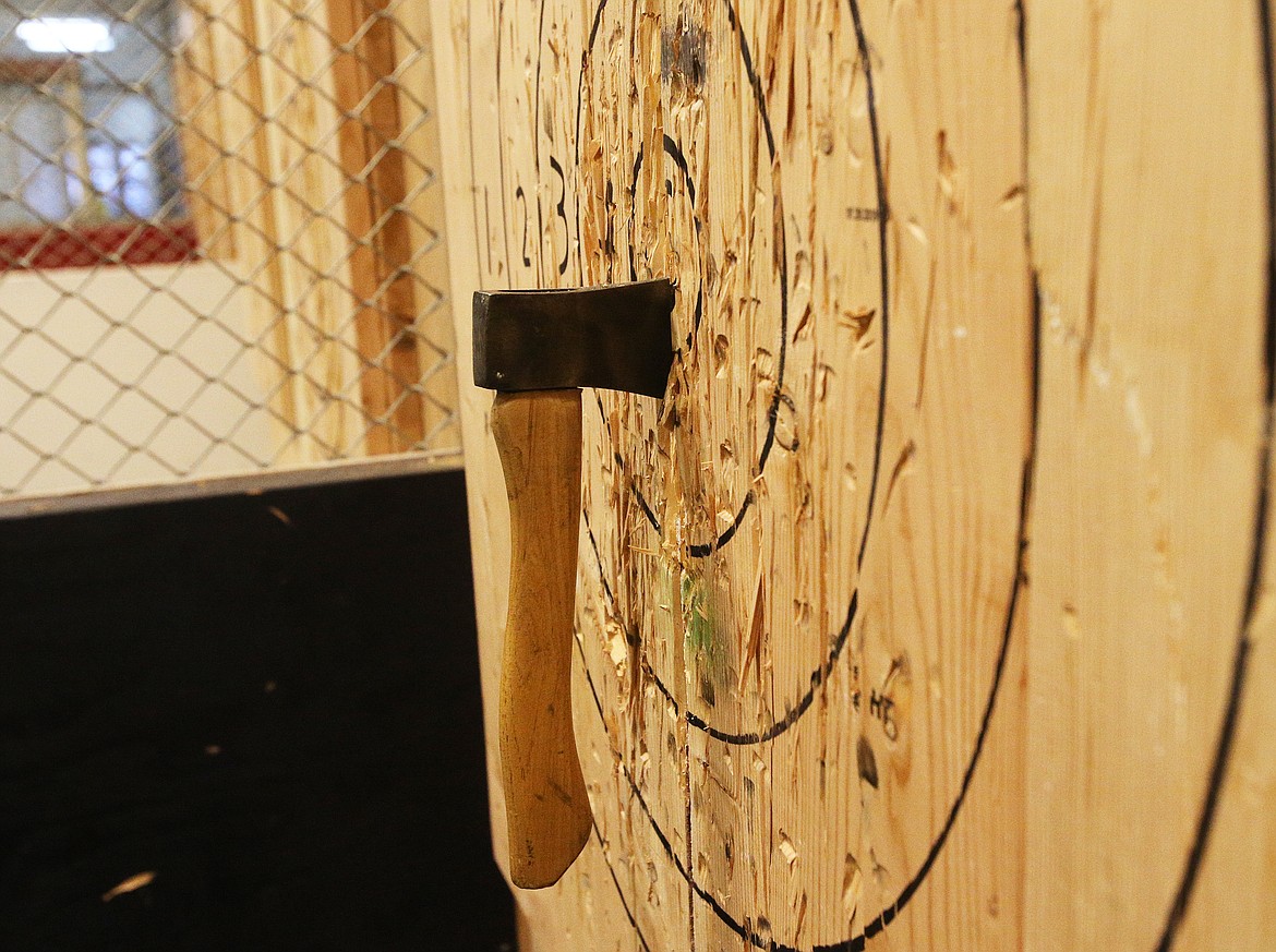 Duncan Andersen threw a few bull's-eyes during his time at Coeur d'Alene's new Axe Force One business in the Silver Lake Mall. (LOREN BENOIT/Press)