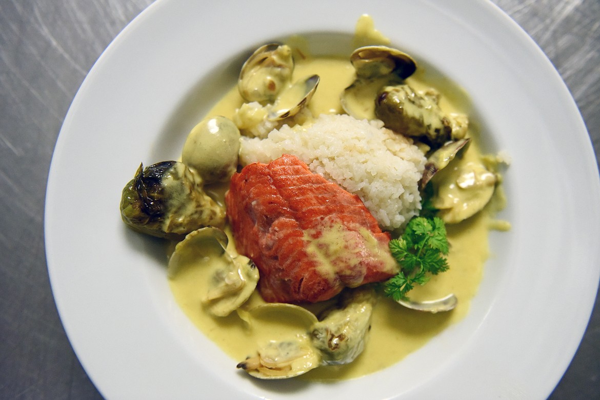 Salmon &amp; Pacific Clams in Gewurtztraminer prepared by the students at the Culinary Institute of Montana at Flathead Valley Community College on Wednesday, April 3. (Casey Kreider/Daily Inter Lake)