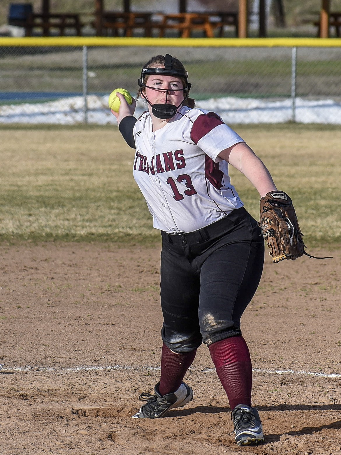 Troy senior pitcher Tristyn Winebark sends out a strike, top of the third, at home against Florence Thursday. (Ben Kibbey/The Western News)