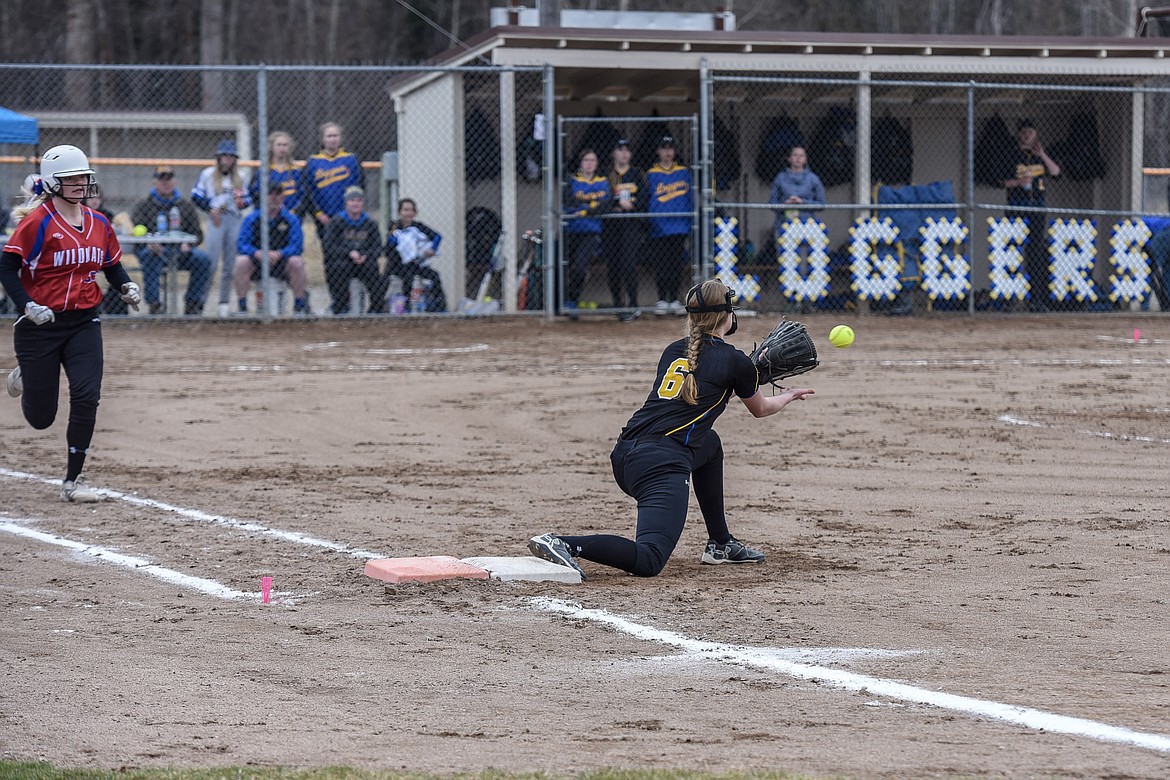 Libby Junior McKenzie Proffitt catches the throw from sophomore shortstop Emily Carvey for the final out, top of the first inning, Saturday at Remp Field The Loggers kept the Wildkats from a single hit until the third inning. (Ben Kibbey/The Western News)