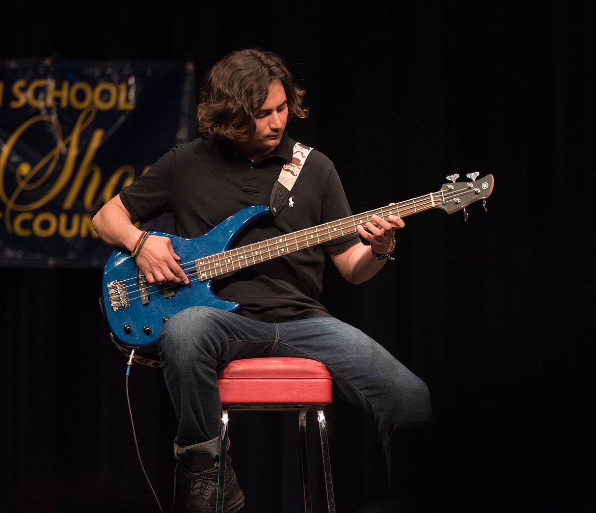 Maximo Haddad plays Just My Imagination on bass for the Libby High School talent show, Thursday at the Libby Memorial Events Center.