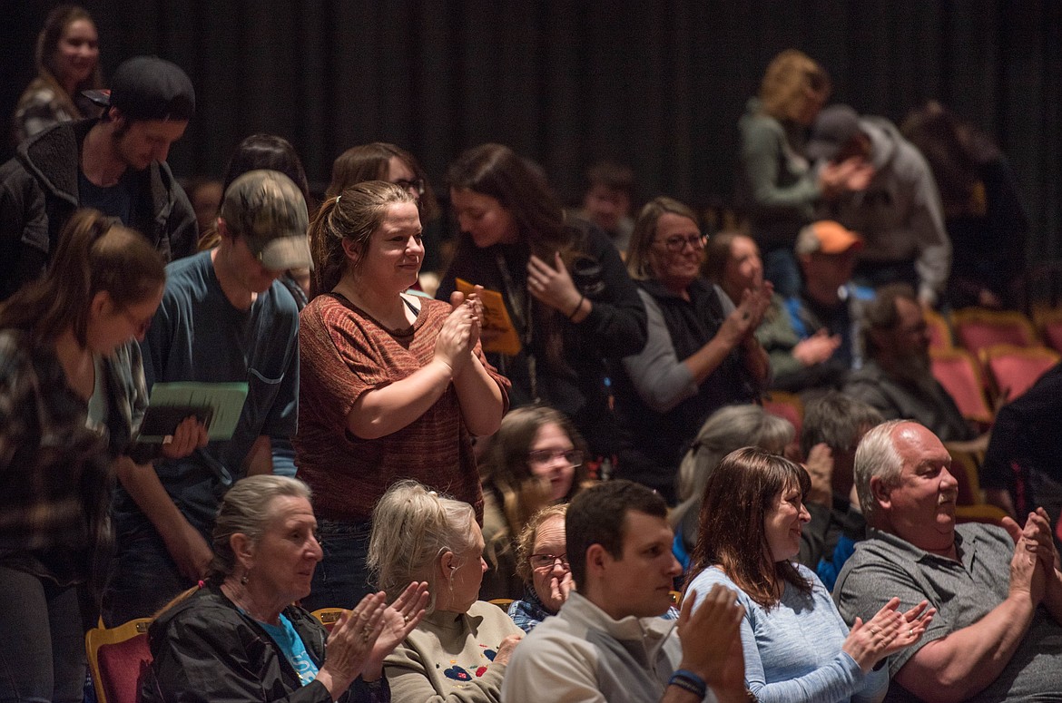 Attendees cheer as a participant finishes their talent act, Thursday at the Libby Memorial Events Center.