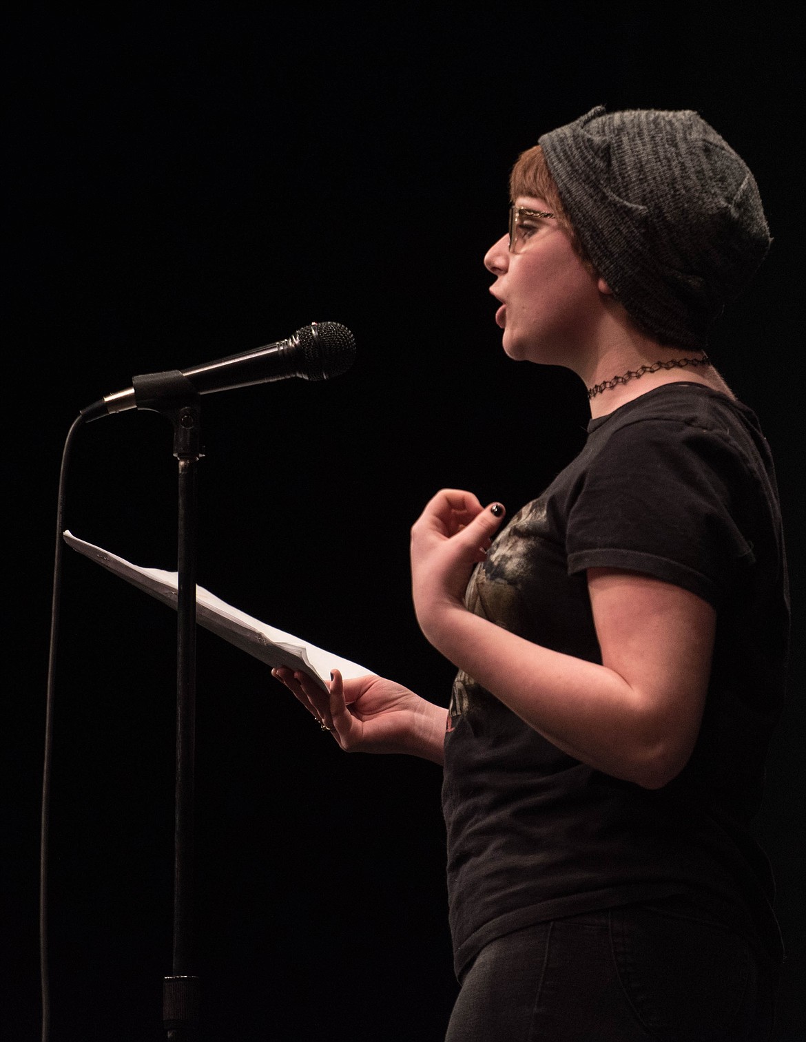 Hannah Beebe reads a poem, When Love Arrives, for the Libby High School talent show, Thursday at the Libby Memorial Events Center.
