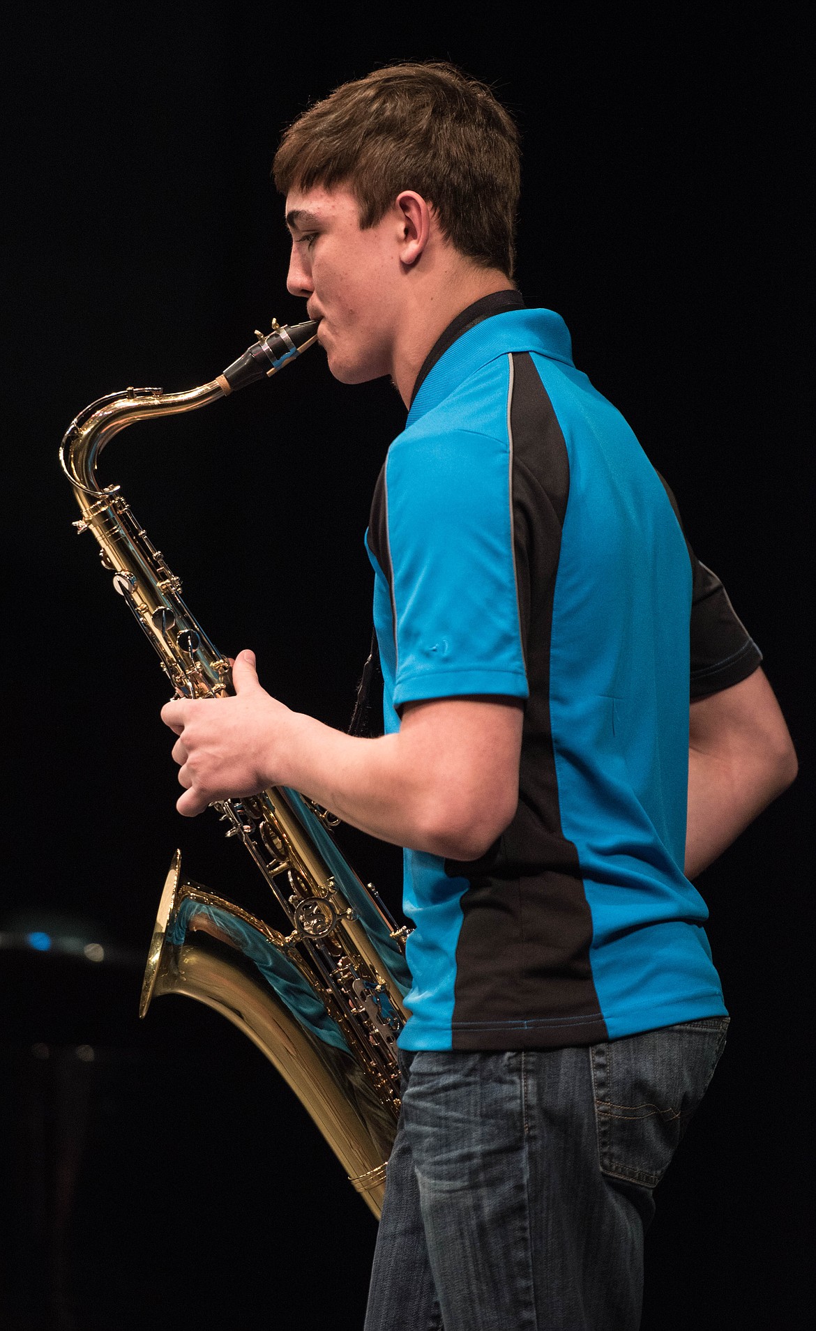 Trey Thompson jams out on his saxophone for the Libby High School talent show, Thursday at the Libby Memorial Events Center.