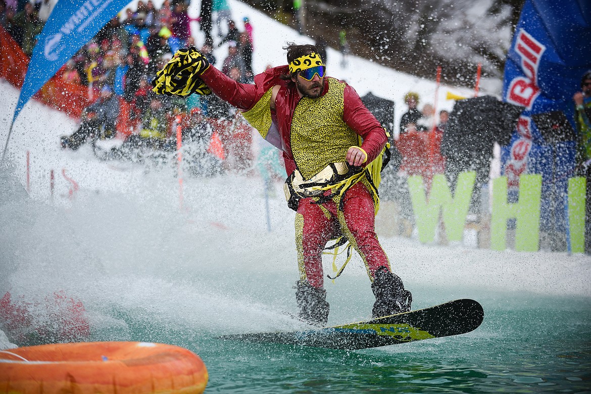 &#147;Macho Man Randy Savage&#148; makes easy work of the pond during the 2019 Pond Skim on Saturday at Whitefish Mountain Resort. (Daniel McKay/Whitefish Pilot)