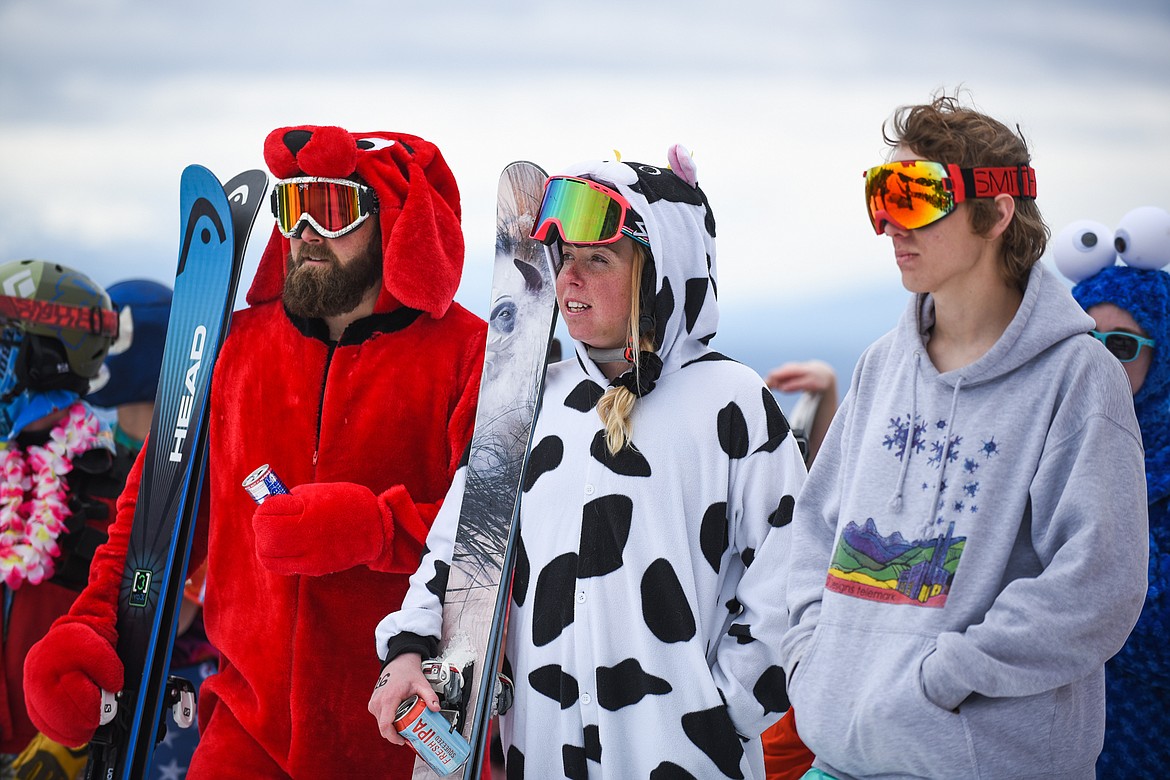 Competitors line up to hear the rules of the 2019 Pond Skim on Saturday at Whitefish Mountain Resort. (Daniel McKay/Whitefish Pilot)