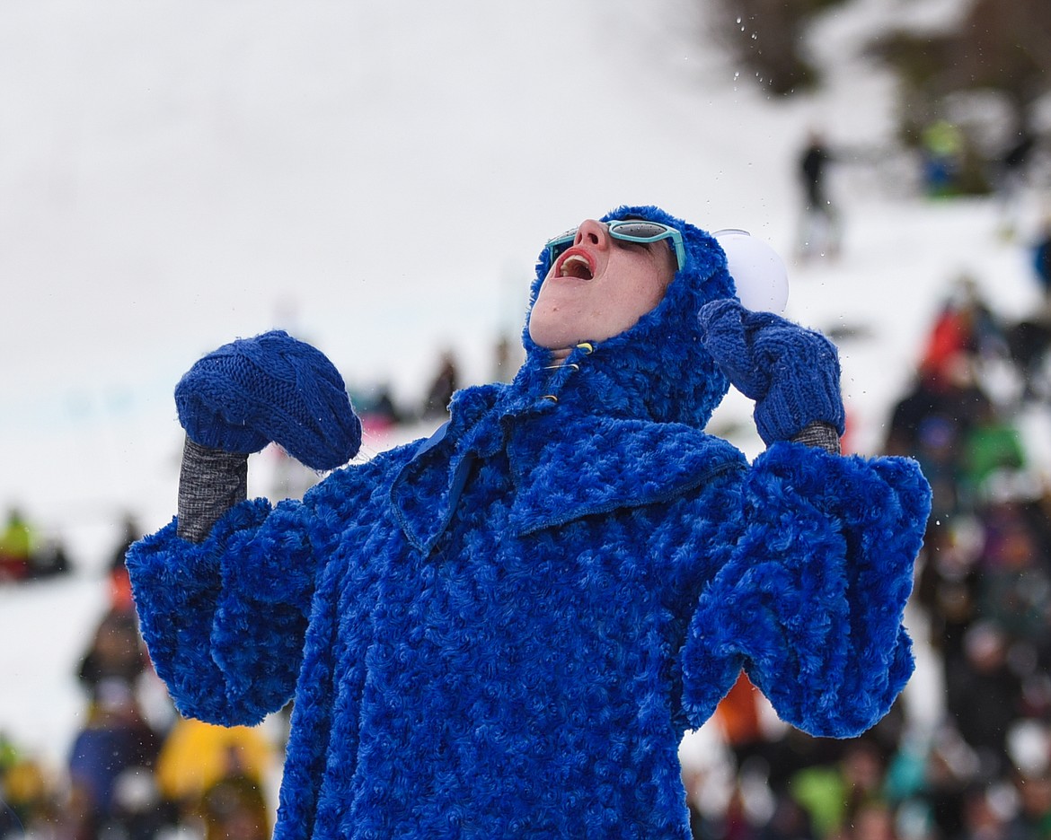 Janelle Stegen, dressed as the &#147;Cookie Monster&#148; celebrates during the 2019 Pond Skim on Saturday at Whitefish Mountain Resort. (Daniel McKay/Whitefish Pilot)