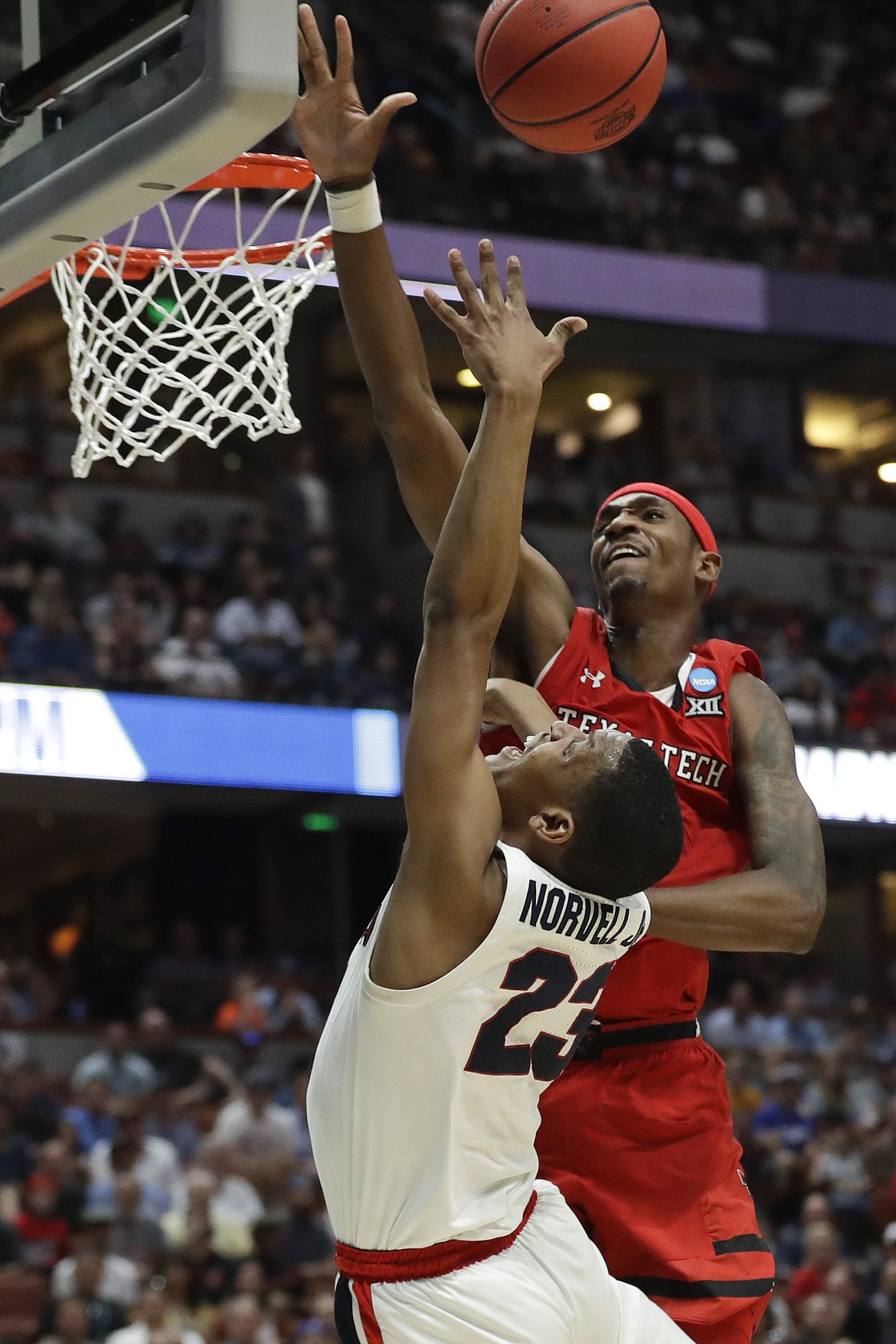 AP Photo/Marcio Jose Sanchez 
Texas Tech forward Tariq Owens blocks a shot by Gonzaga guard Zach Norvell Jr. during the second half of the Red Raiders&#146; 75-69 win Saturday in Anaheim, Calif.