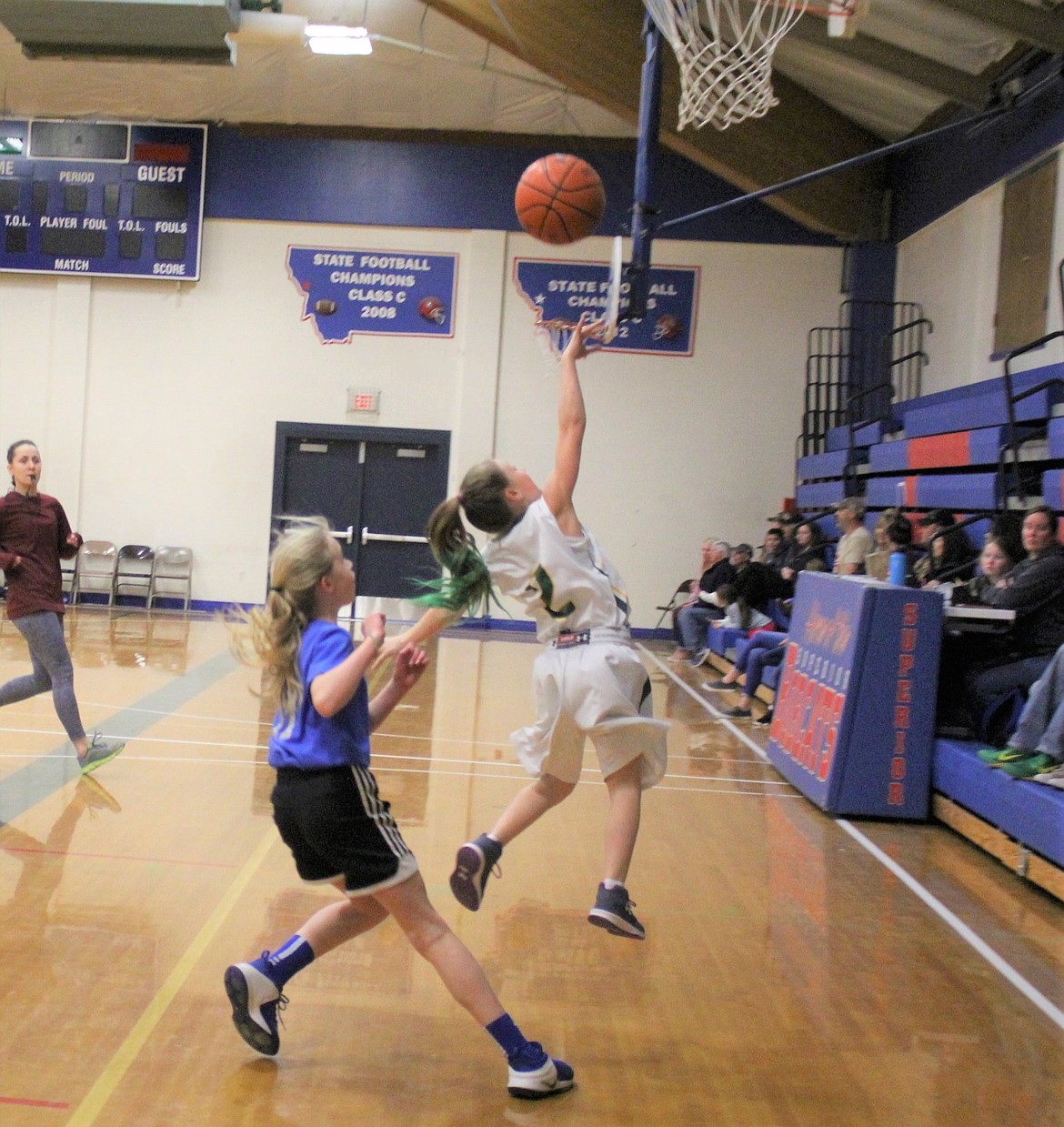 DURING THE St. Regis girls&#146; game against Trout Creek, Shylah Dalka goes in for a layup in fifth- and sixth-grade division play during the annual Superior Hoop Shoot.