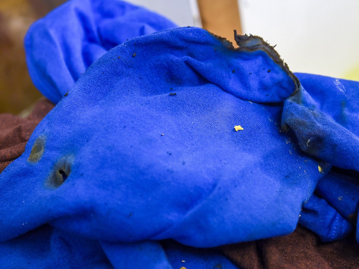 Among the damaged apparel, some items showed signs of attempts to light them on fire Monday. (Ben Kibbey/The Western News)