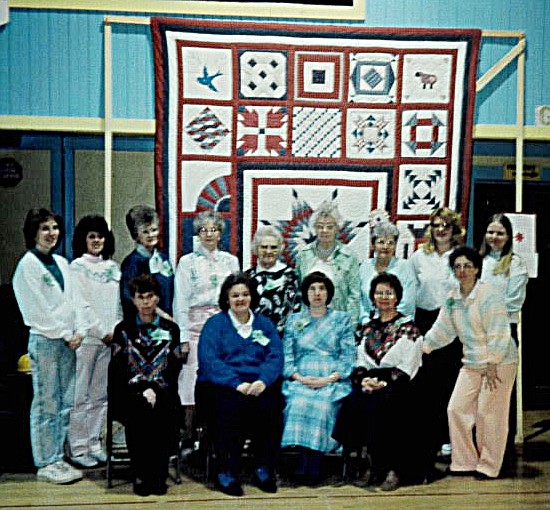 FLATHEAD QUILTING Guild Secretary Brenda Shively curates 30 years of club scrapbooks. This photo is from the guild&#146;s second year, 1990. Pictured, front row from left, are Ginger Ward, Barbara Farrington, Carla Olson, Judy Rockwell, Brenda Shively; and back row, Sarah Naegeli, Karen Glass, Jean Cyr, Emmy Storholm, Elaine Boswell, Sylvia Brotherton, Elsie Weigand, unknown and Claudia Paul. Not pictured: Don Brey, Cindy LaFriniere, Betty Nicholson and Lynn Bierwagon. (Courtesy photo)