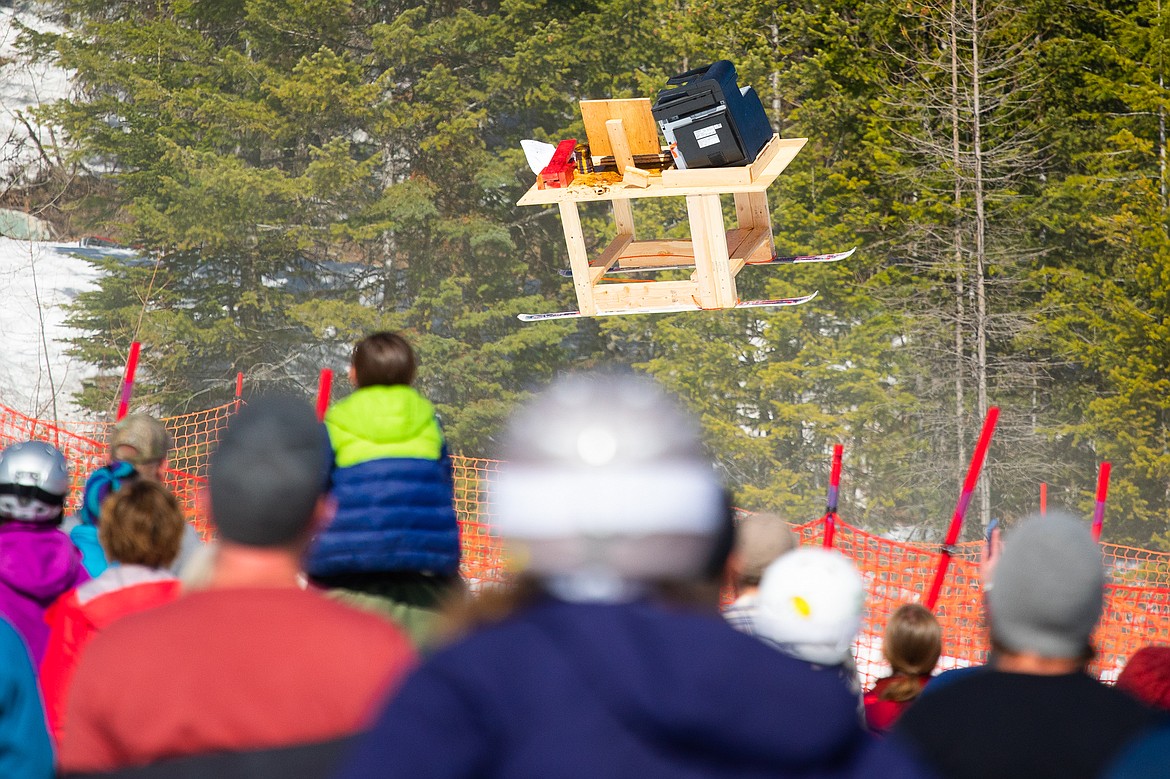 Someone's personal office hangs in the air during the Dummy Derby at Whitefish Mountain Resort on Saturday. (Daniel McKay/Whitefish Pilot)
