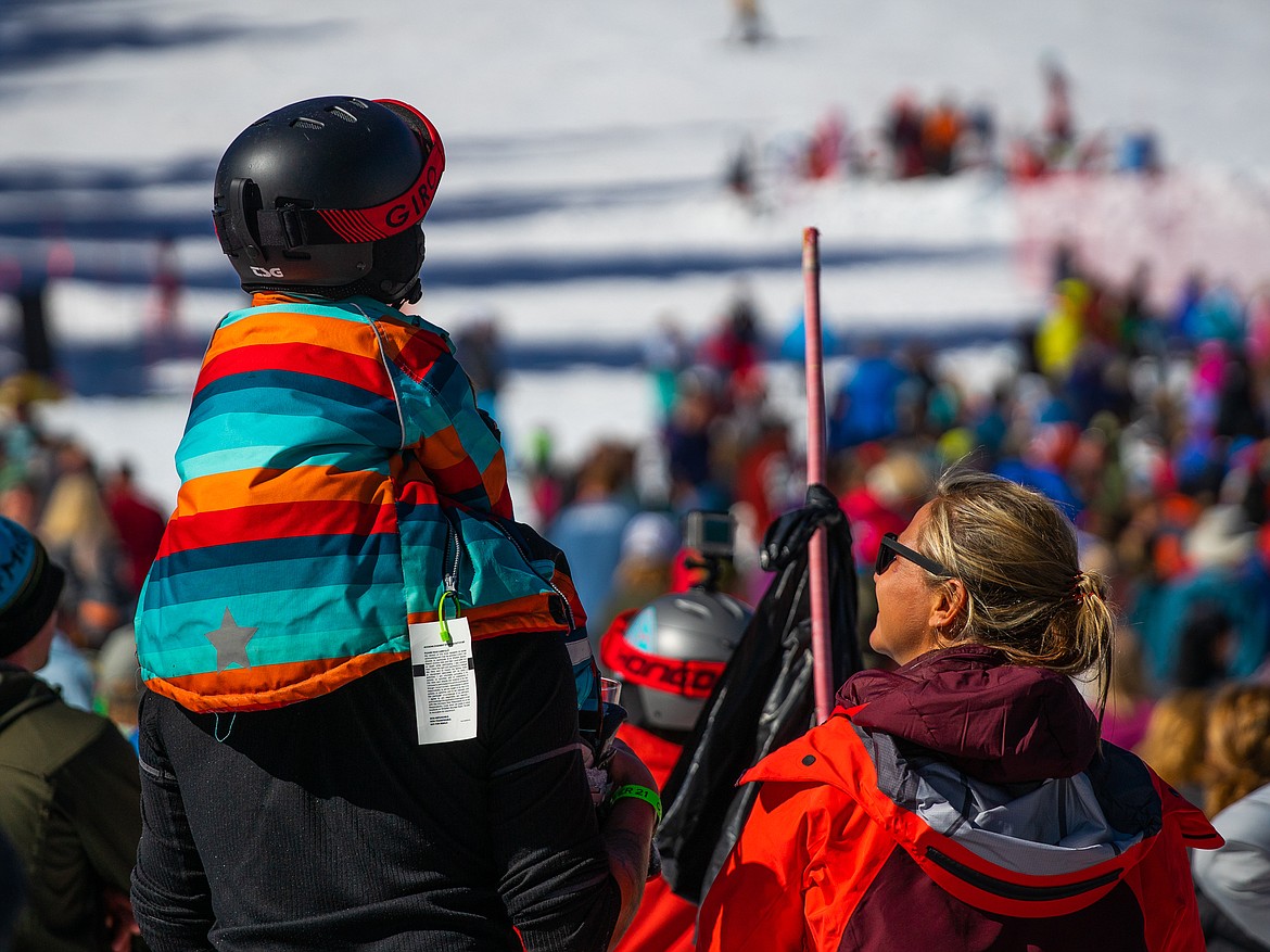 A family watches the Dummy Derby at Whitefish Mountain Resort on Saturday. (Daniel McKay/Whitefish Pilot)