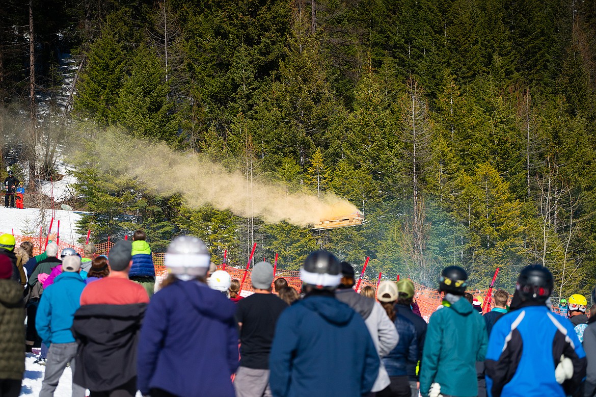 A sledding carrying some dusty rocks launches off a jump during the Dummy Derby at Whitefish Mountain Resort on Saturday. (Daniel McKay/Whitefish Pilot)