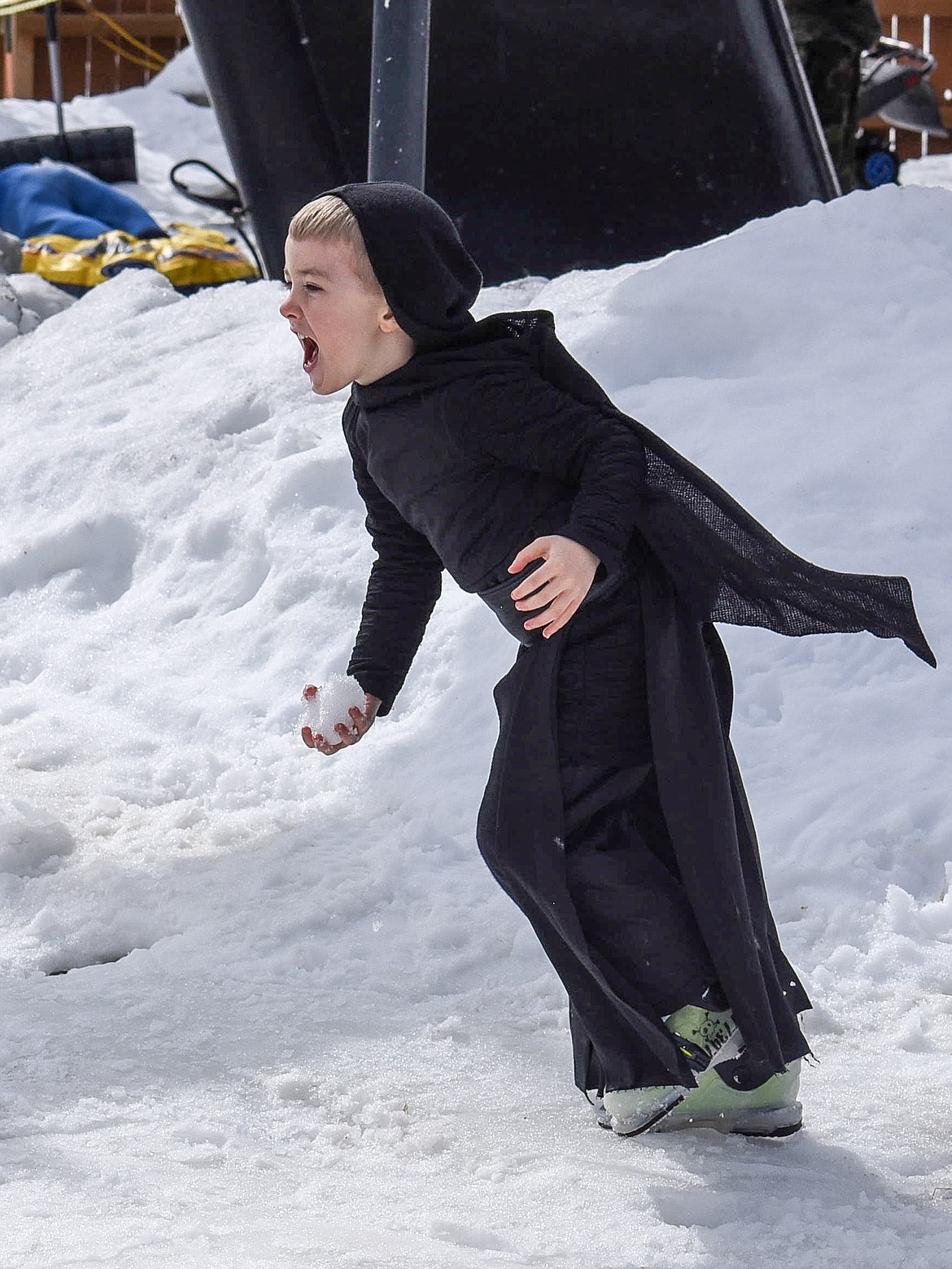 Timber Parker -- in a Darth Vader costume -- charges in with a snowball during free moment of horseplay at Crazy Dayz. (Ben Kibbey/The Western News)