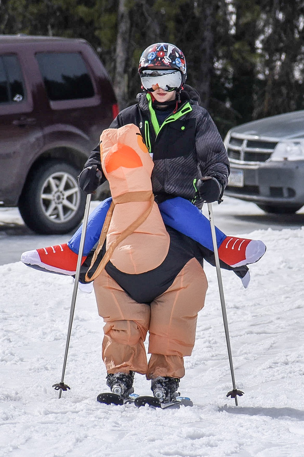 Carson Williams skied the mountain as an ostrich rider at Crazy Dayz. (Ben Kibbey/The Western News)