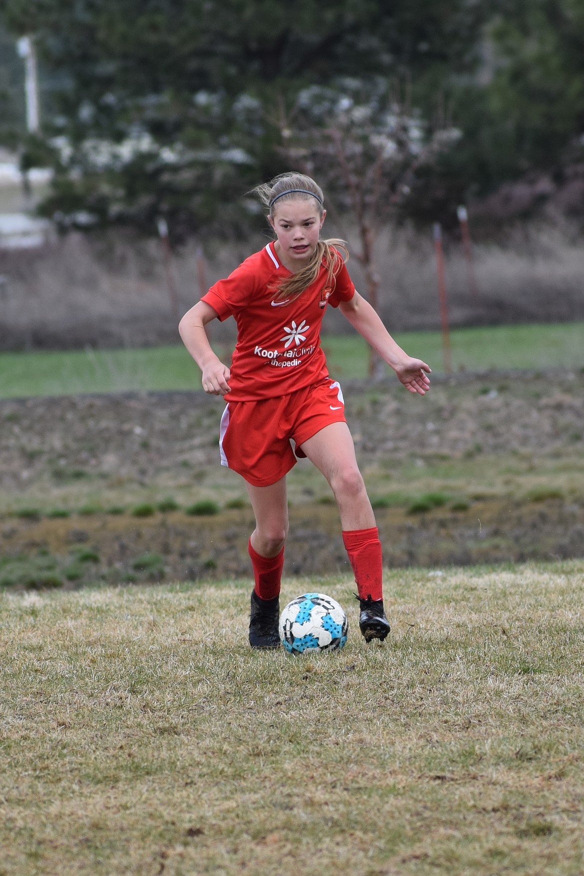 Courtesy photo
Rachel Corette of the Thorns North FC 07 Girls Red soccer team drives down the field during the April 14 game against IEYSA Storm to score her fourth goal of the season.