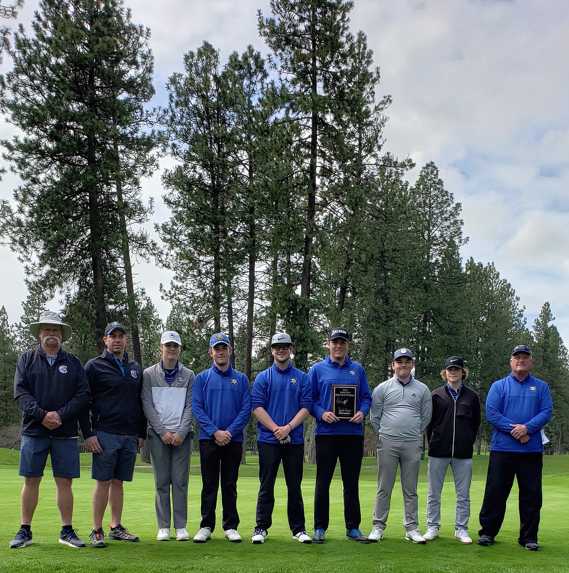 Coeur d&#146;Alene won the boys team title at Monday&#146;s Lake City Invitational. From left, Coach Craig Leaf, Coach Chase Bennett, Wyatt Williams, Brayden Ogle, Sam Johnson, Jackson Davenport, Cole Jaworski, Trace Goucher, Head Coach Bryan Duncan.