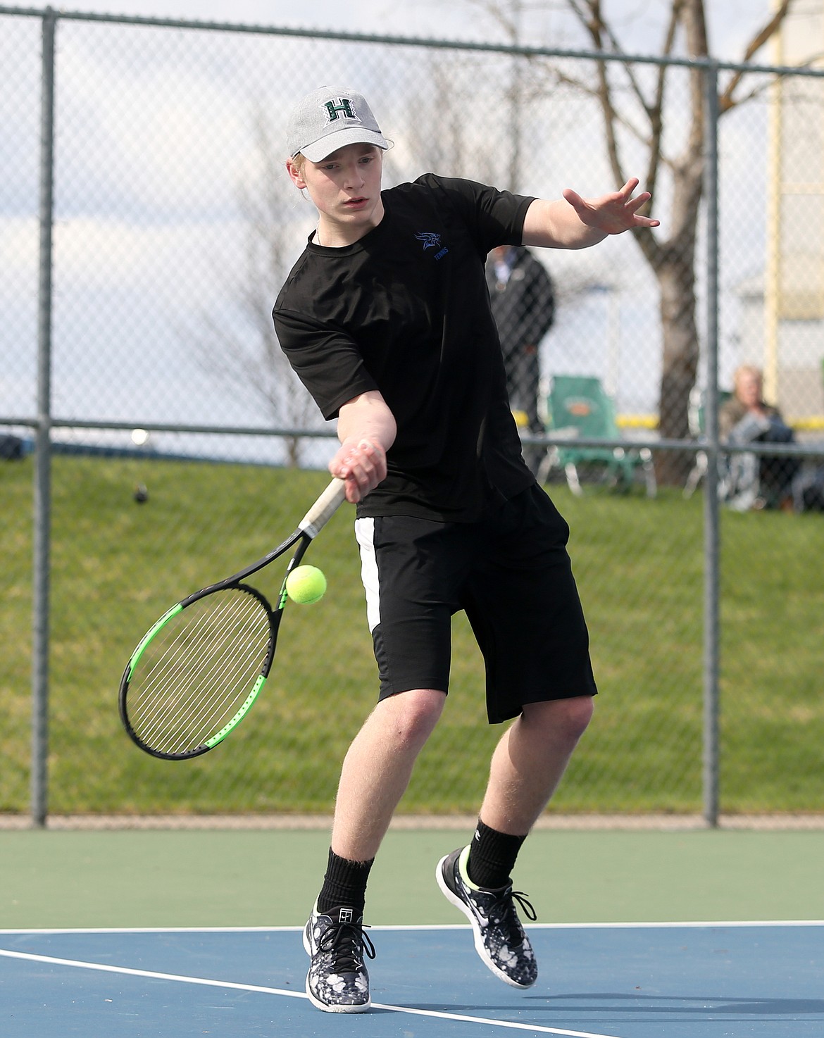 Coeur d&#146;Alene&#146;s Bayley Throm hits a forehand in a match against Malakai Verduzco of Post Falls High on Thursday at Coeur d&#146;Alene High School.