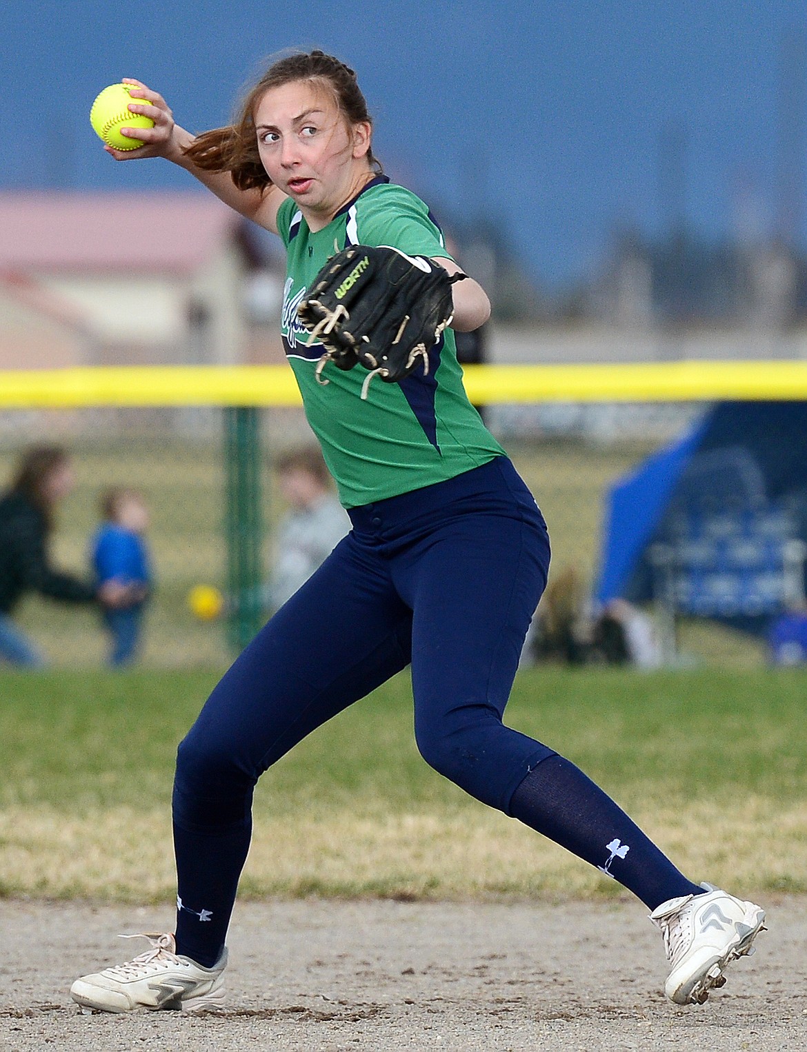 Glacier shortstop Jennifer Wallace (3) fields and throws to first on a grounder in the fourth inning against Missoula Hellgate at Glacier High School on Friday. (Casey Kreider/Daily Inter Lake)