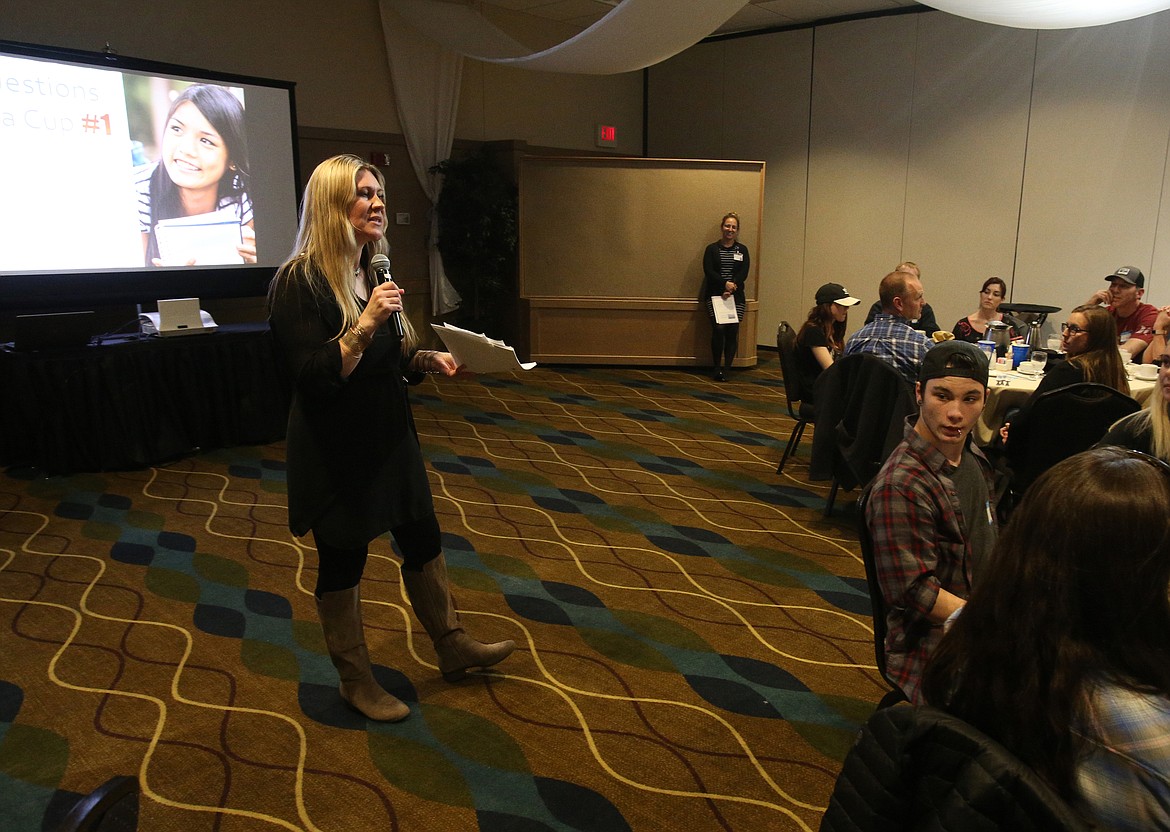 Panhandle Health Program Manager Alicia Keller leads parents and teens in an interactive workshop during Thursday night's Bridging the Gap event at the Best Western Plus Coeur d'Alene Inn. (LOREN BENOIT/Press)