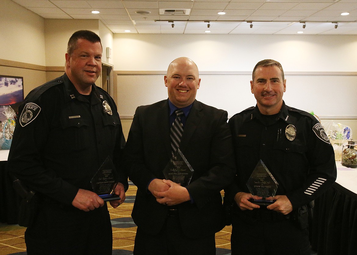 From left, Coeur d&#146;Alene Police Department Capt. David Hagar, Detective Jake Rogers, and Chief Lee White and the police department were this year&#146;s recipients of the KCTFHR Civil Rights Award for their work in handling a hate crime that happened at the McDonald&#146;s on Hanley Avenue in July of last year. (LOREN BENOIT/Press)