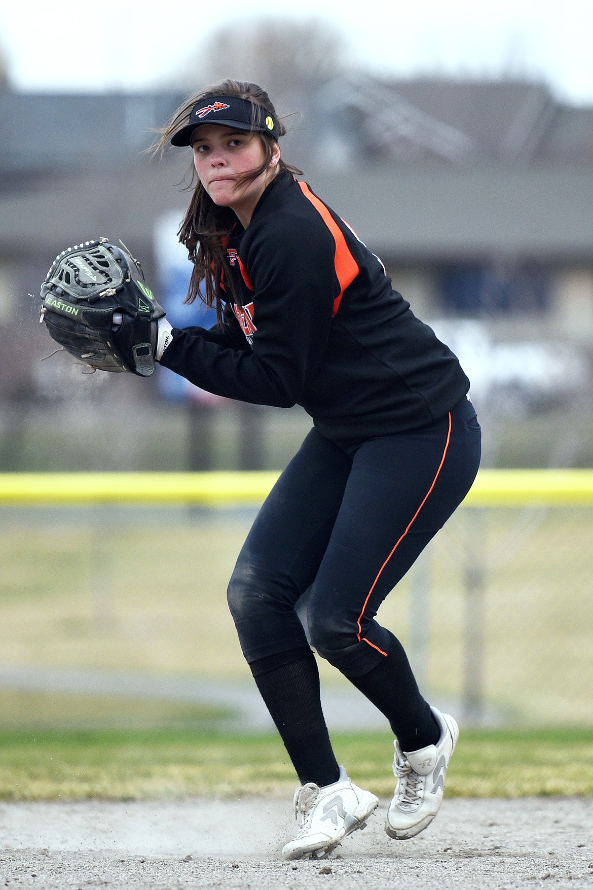 Flathead shortstop Riley Chouinard fields and throws to first against Glacier at Kidsports Complex on Tuesday. (Casey Kreider/Daily Inter Lake)