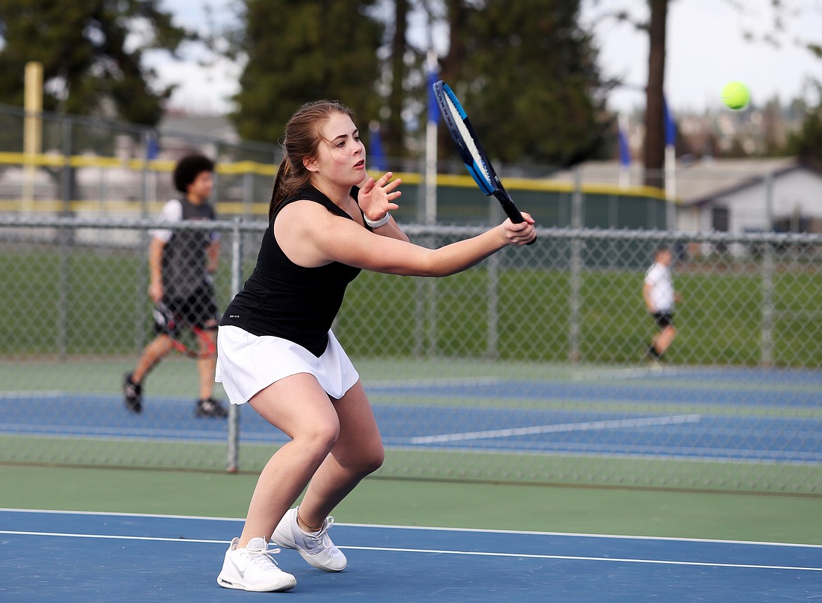 Coeur d&#146;Alene&#146;s Maggie Bloom hits a volley back over the net in the No. 1 girls double match Thursday at Coeur d&#146;Alene High School. (LOREN BENOIT/Press)