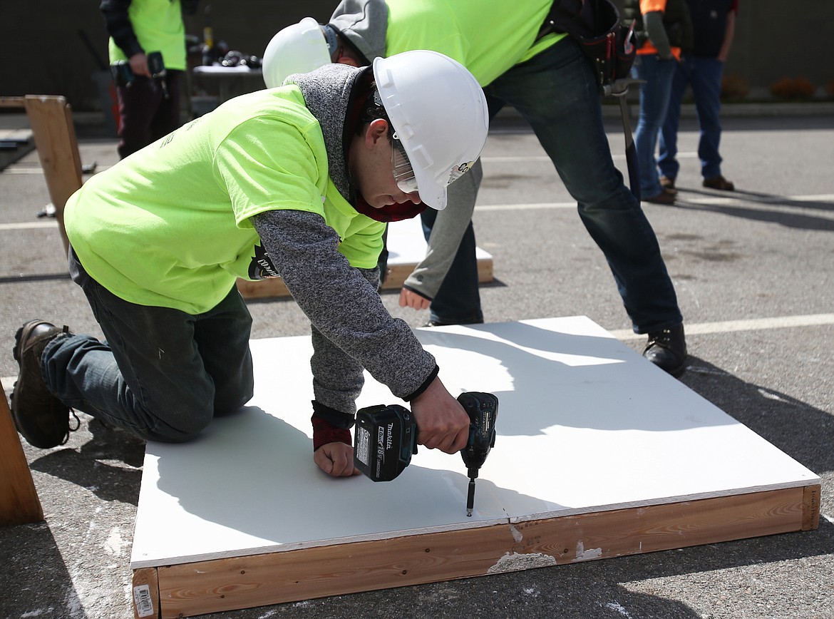 Lake City High School junior Cody Benner finishes a board of drywall during Thursday's Construction Combine event at Kootenai Technical Education Campus. (LOREN BENOIT/Press)