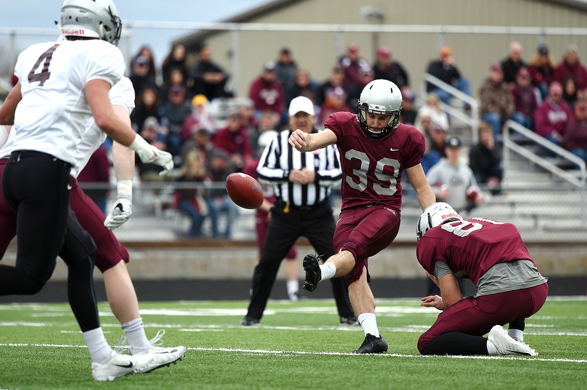 Montana Grizzlies kicker Brandon Purdy, a Glacier High School graduate, boots an extra point after a first-quarter touchdown by wide receiver Samuel Akem in the Spring Game at Legends Stadium in Kalispell on Saturday. (Casey Kreider/Daily Inter Lake)