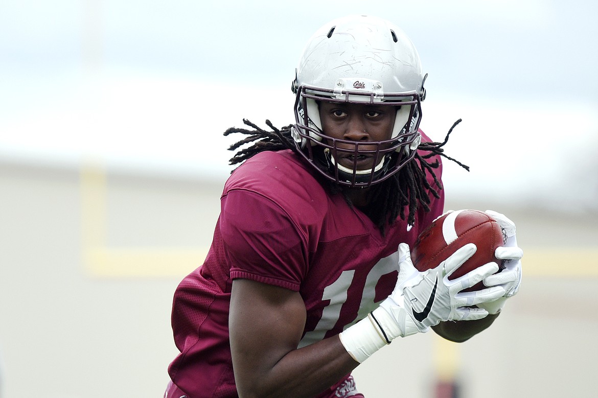 Montana Grizzlies wide receiver Samuel Akem (18) heads upfield on a 36-yard, first-quarter touchdown reception in the Spring Game at Legends Stadium in Kalispell on Saturday. (Casey Kreider/Daily Inter Lake)