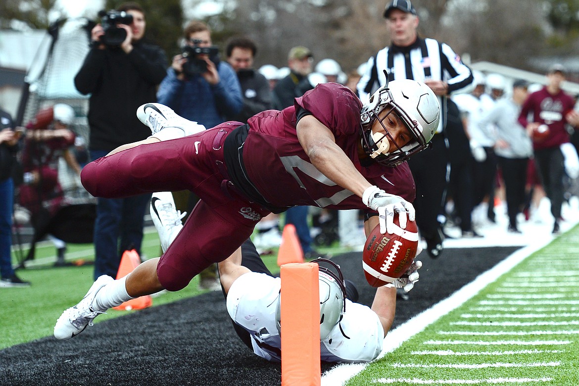 Montana Grizzlies running back Marcus Knight dives for the end zone on a long run from scrimmage during the Spring Game at Legends Stadium in Kalispell on Saturday. Knight was ruled out of bounds just short of the end zone. (Casey Kreider/Daily Inter Lake)